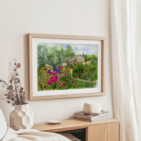 Cosy thatched house pink flower garden art. Pink and green floral country style wall print.