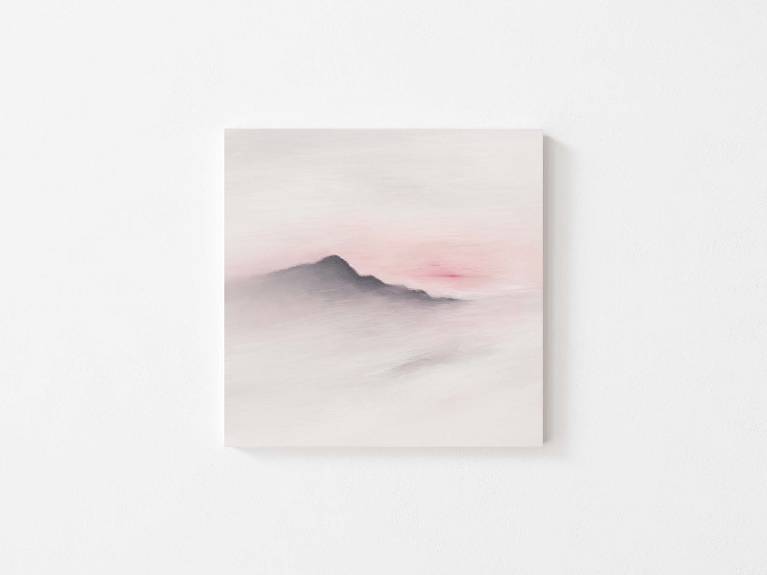 Soft blush tones and simple mountain design in wall art print.