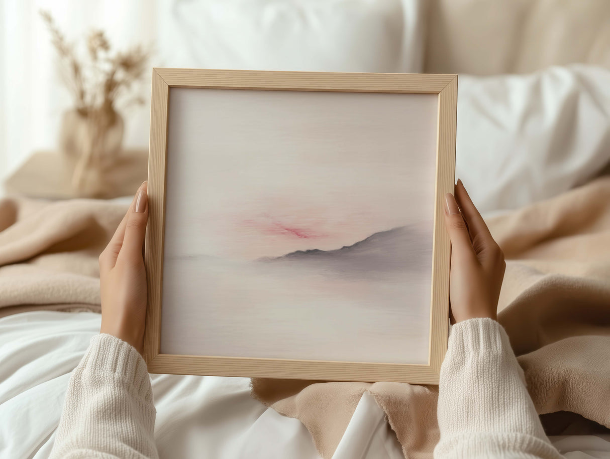 Hill and sky artwork in soft neutral colours.