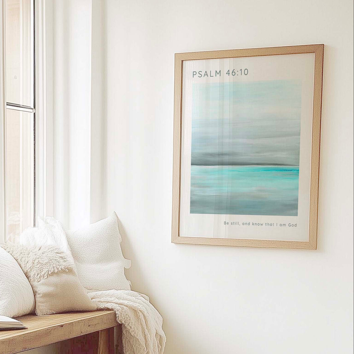 Be Still And Know That I Am God wall art with turquoise sea design and modern Christian font layout.
