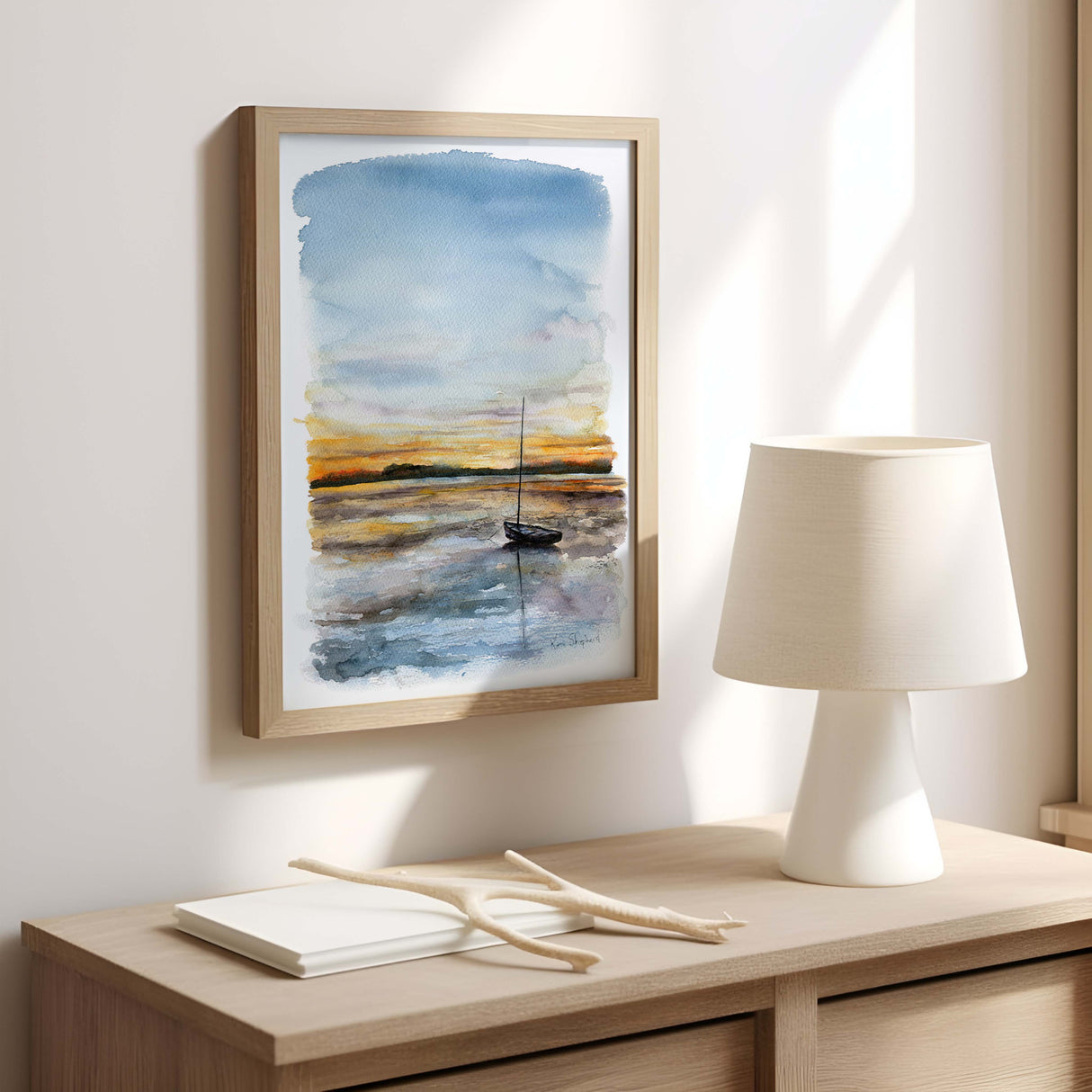 Coastal watercolour showcasing a beached boat in a peaceful seaside scene.