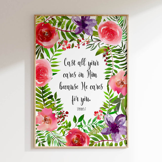 Red and purple floral Bible verse wall art with the words 'Cast all your cares on Him because He cares for you'.