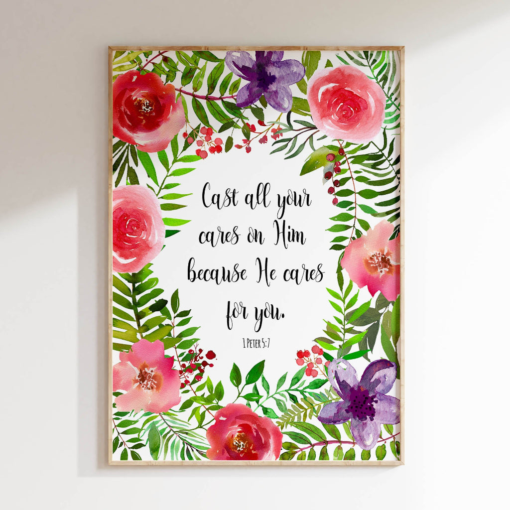 Red and purple floral Bible verse wall art with the words 'Cast all your cares on Him because He cares for you'.