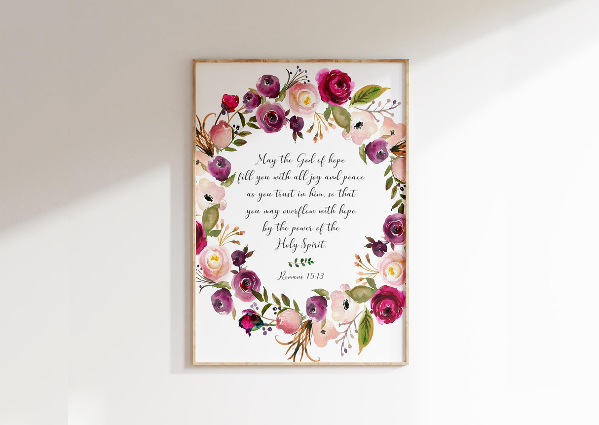 Floral Christian wall art featuring the Bible verse Romans 15:13 surrounded by delicate botanical designs in soft, elegant colours.