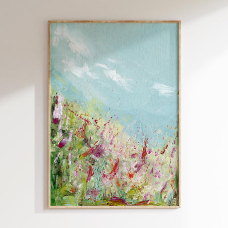 ‘Colours of the Field’ – Abstract meadow print with pink and orange flowers beneath a blue sky.