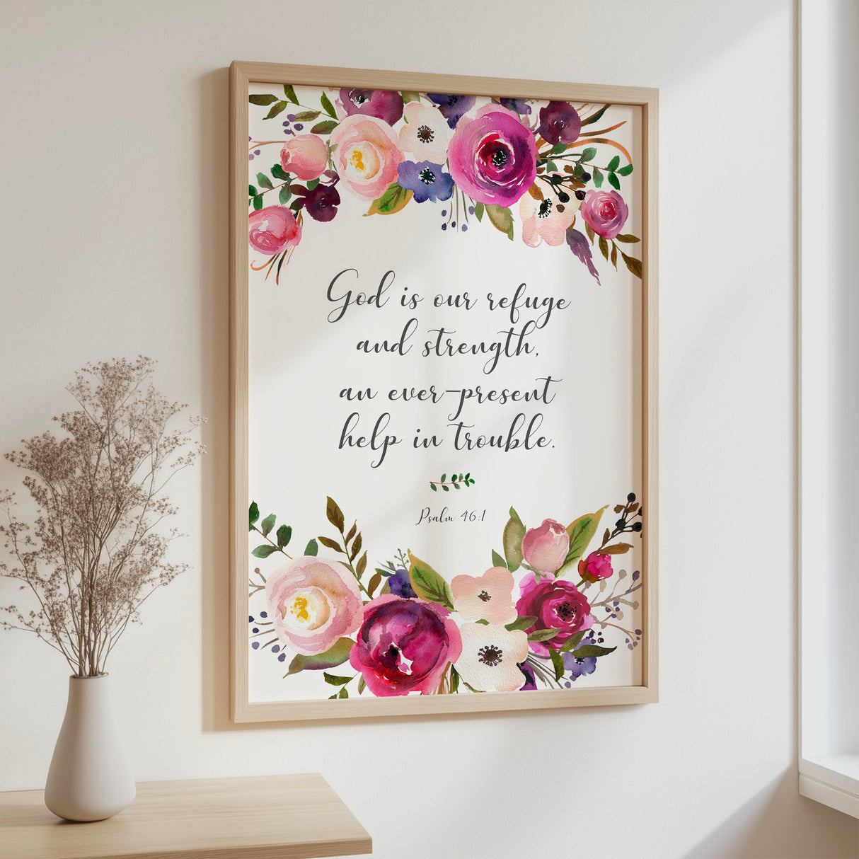 Inspirational Christian decor with Psalm 46:1 in a delicate floral wreath reminding of divine protection.
