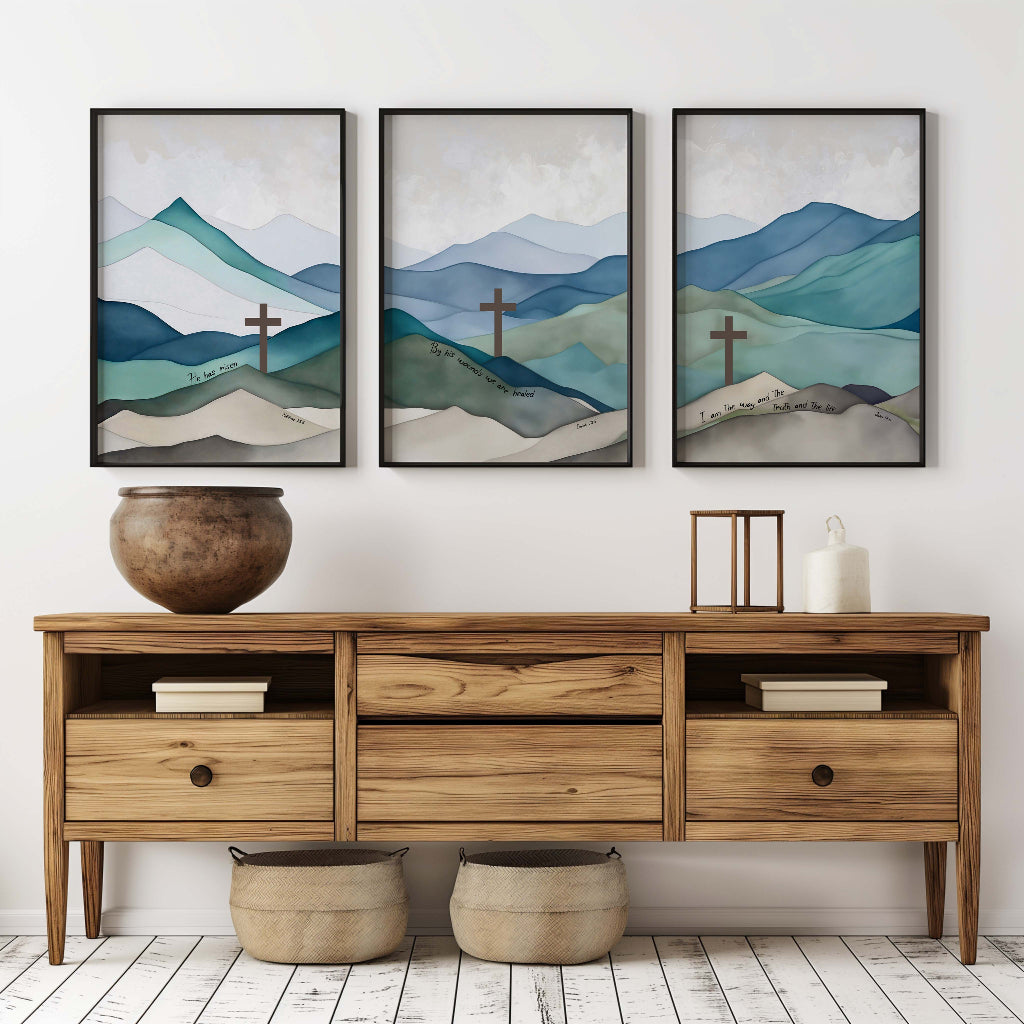 Christian triptych wall art set featuring serene blue and green mountain landscapes with Easter scriptures from Matthew 28:6, Isaiah 53:5, and John 14:6.