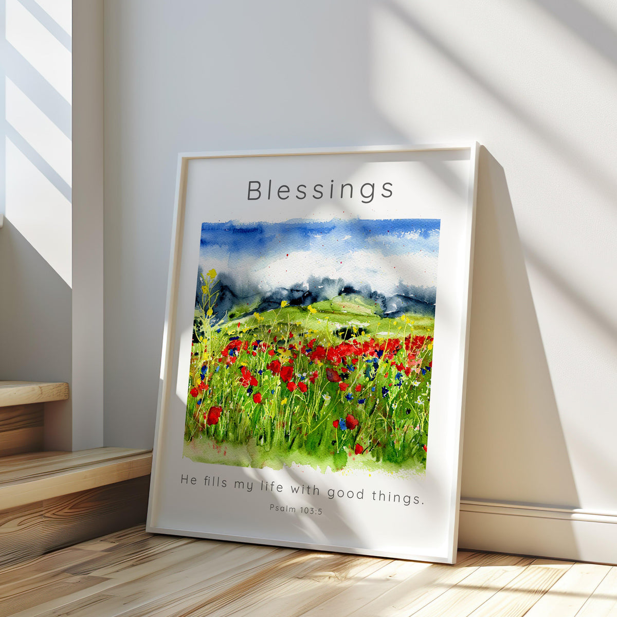 Christian wall art featuring Psalm 103:5 in elegant script over a hand-painted wildflower landscape.