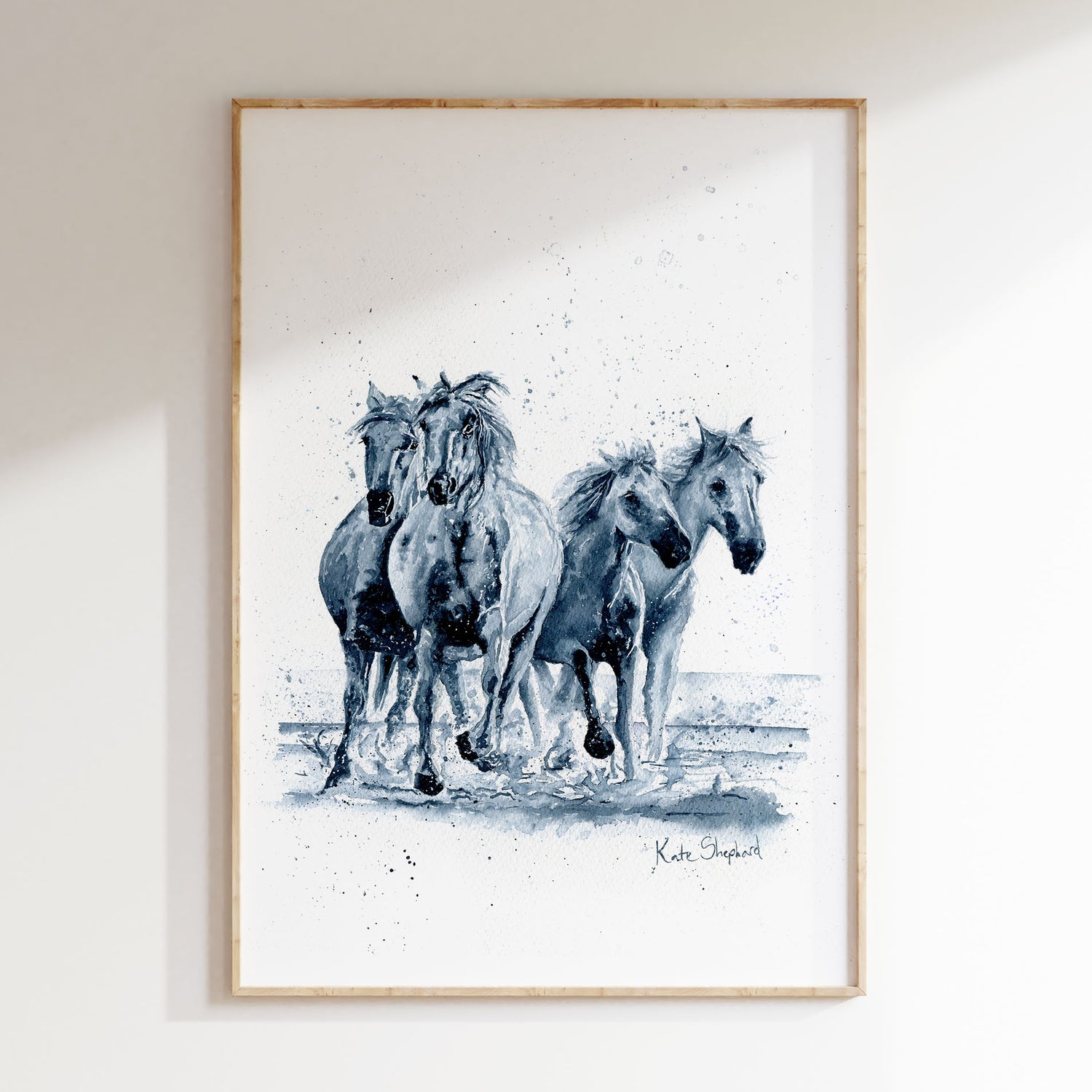 Monochrome equestrian art print called ‘Running Horses’ showing horses in fluid motion.