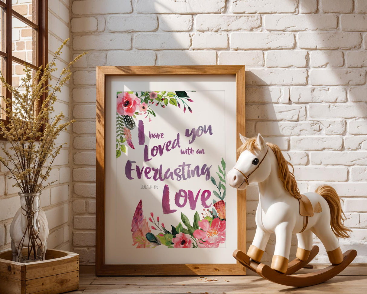 Inspirational scripture wall art with floral and feather design and verse from Jeremiah 31 3.