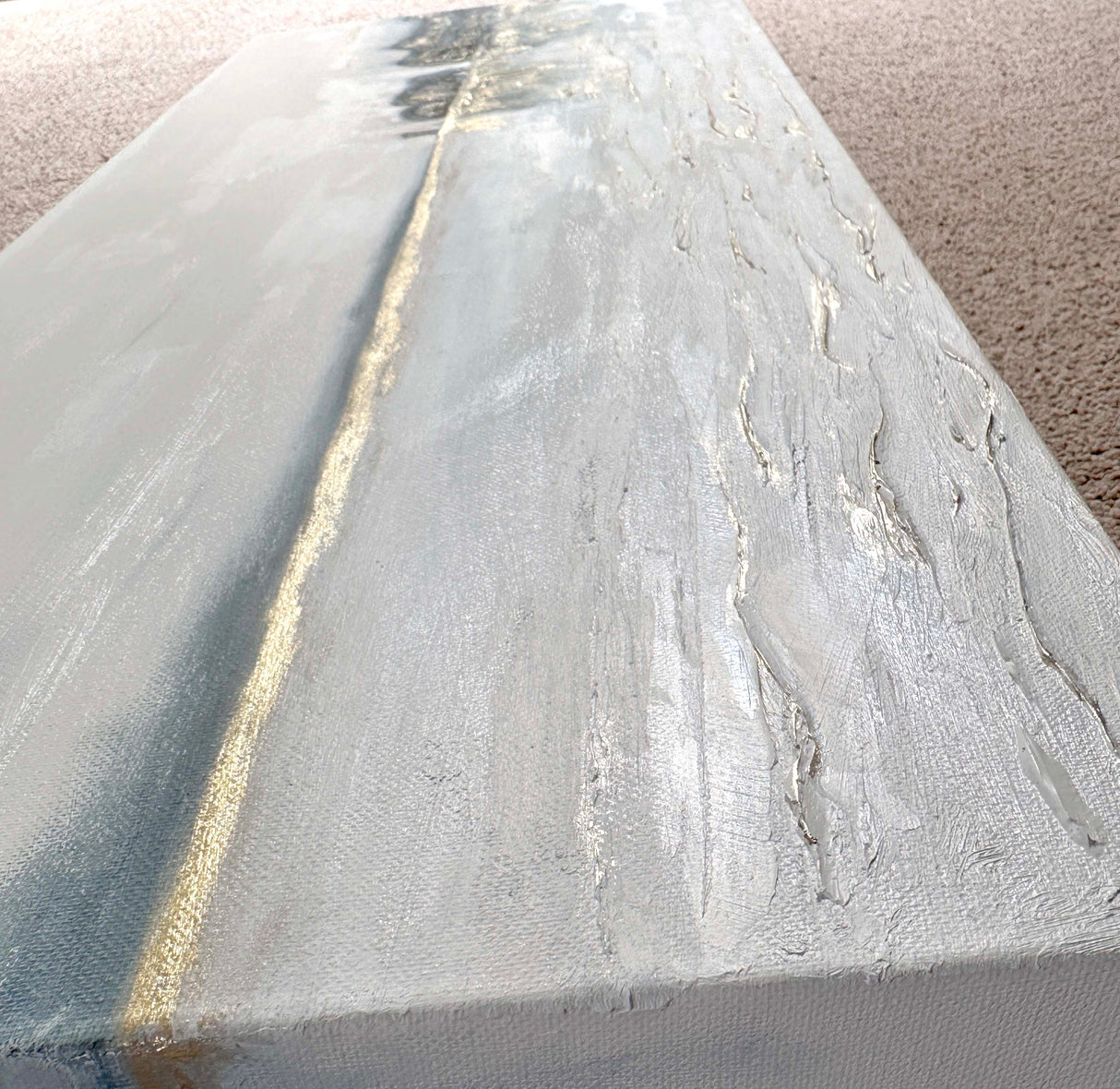 Narrow canvas oil painting showing Old Harry Rocks under a dramatic sky with gold reflections in the water.