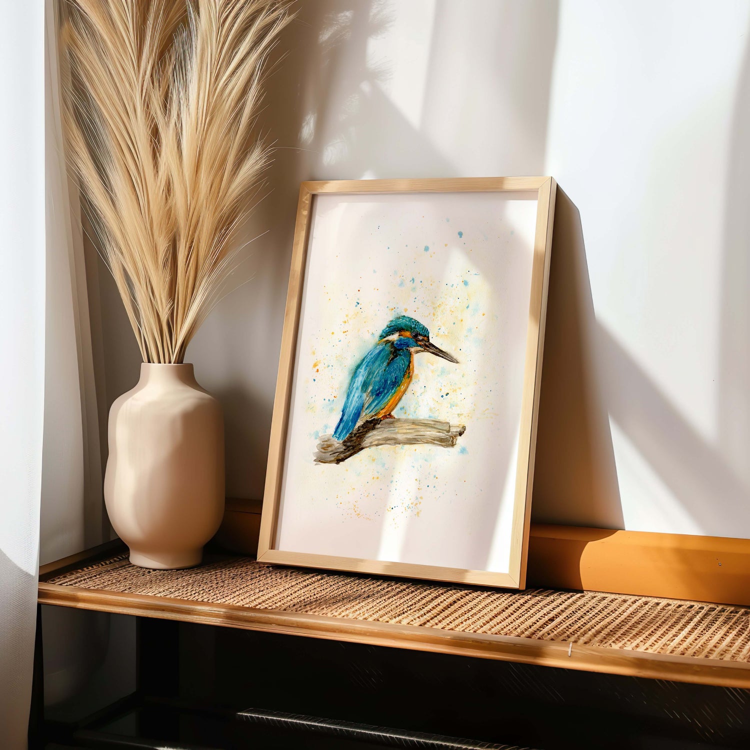 Blue and orange kingfisher bird on a branch in a minimalist watercolour print. Artistic kingfisher watercolour with loose brushstrokes and natural tones.