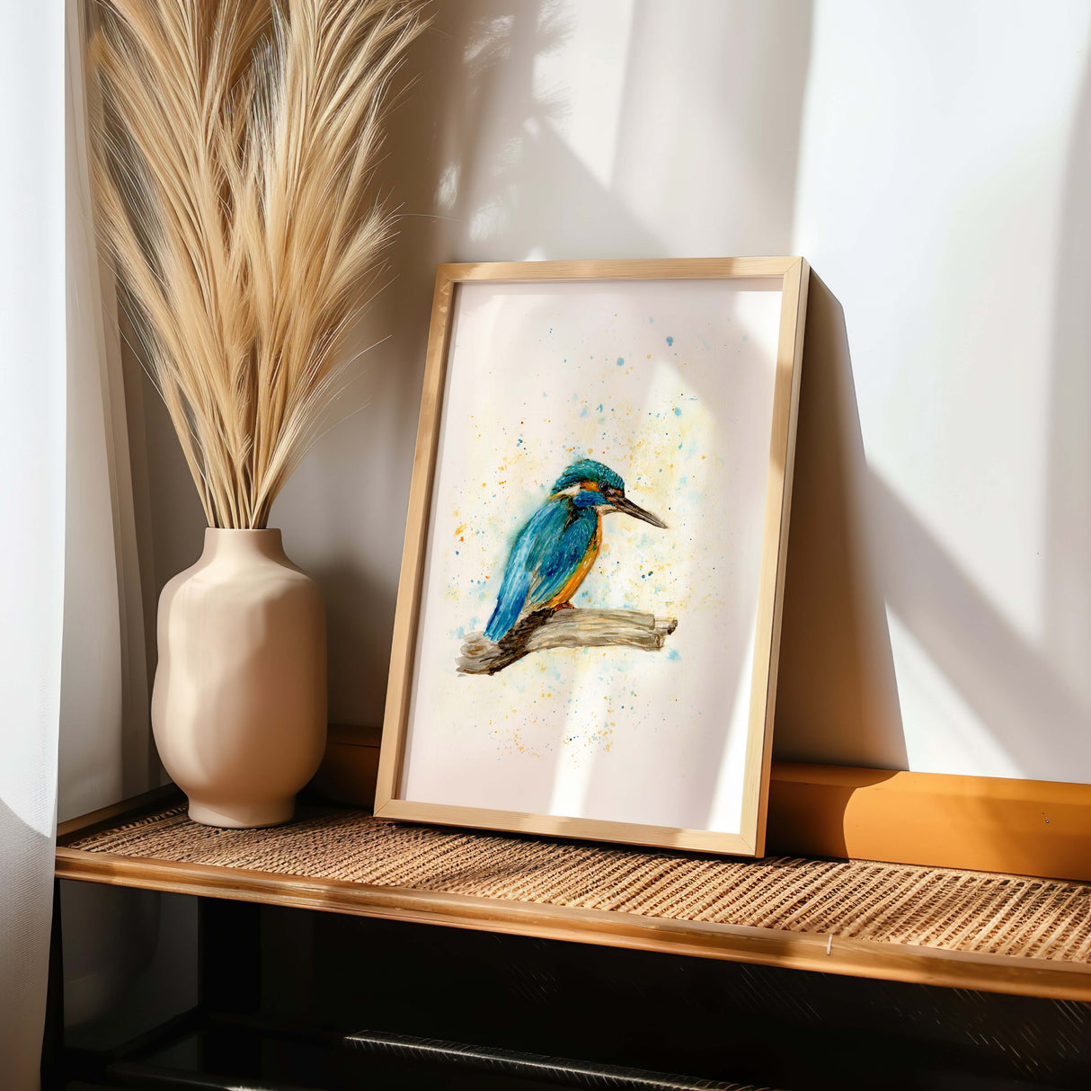 Blue and orange kingfisher bird on a branch in a minimalist watercolour print. Artistic kingfisher watercolour with loose brushstrokes and natural tones.