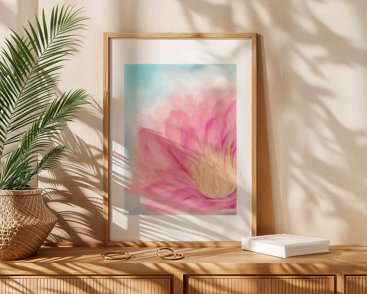 Close-up lotus artwork showing soft pink petals and yellow detail on a blue background.