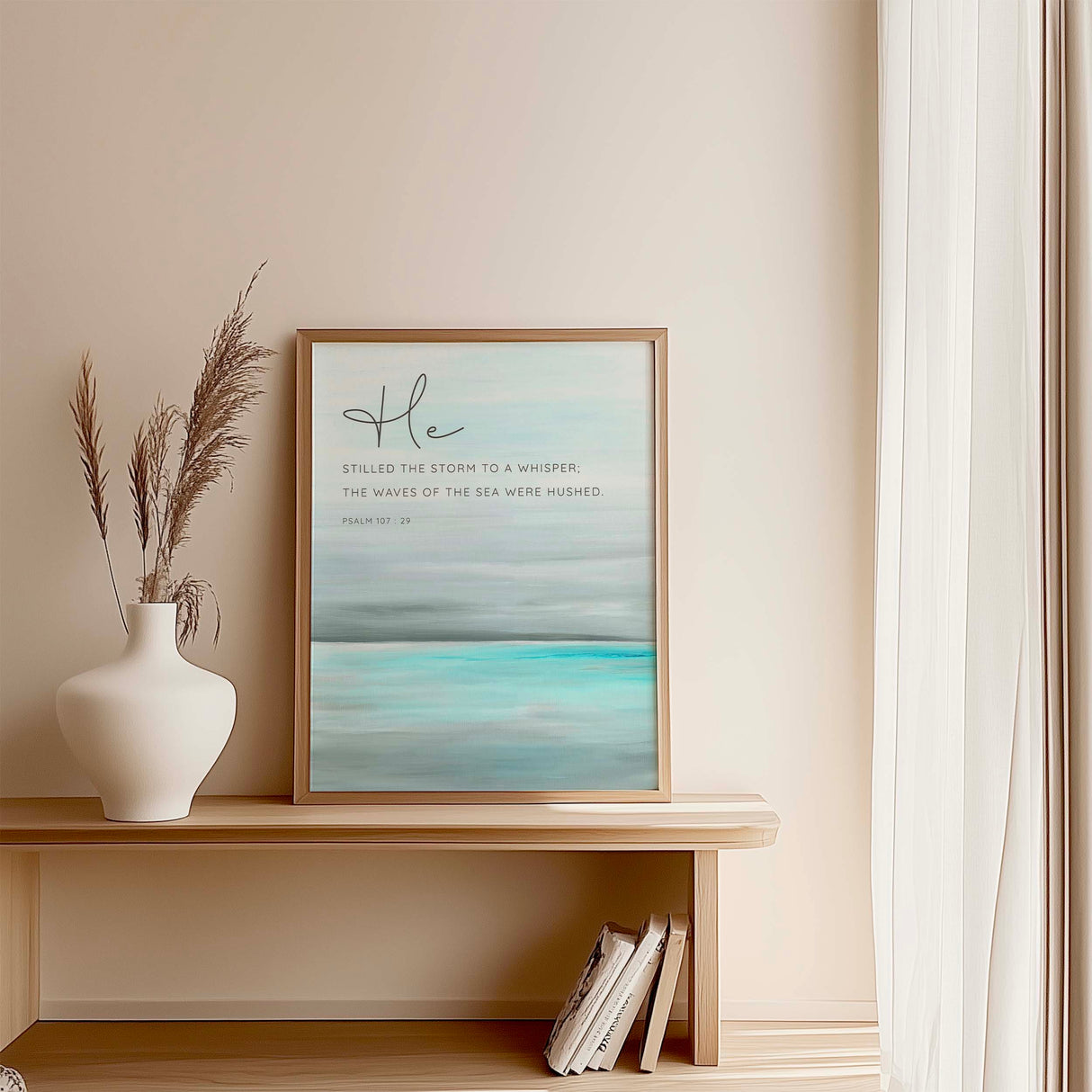Serene Christian wall art of calming sea with verse from Psalm 107:29 about peace and God's presence in the storm.