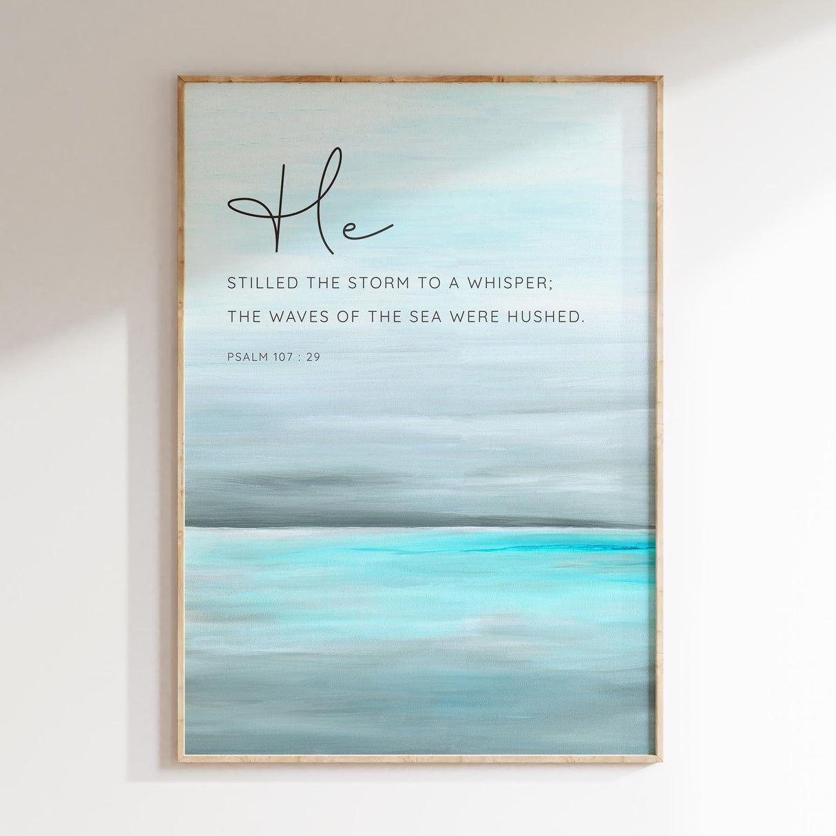 Psalm 107:29 turquoise sea print showing peaceful ocean waves with Bible verse “He stilled the storm to a whisper.”