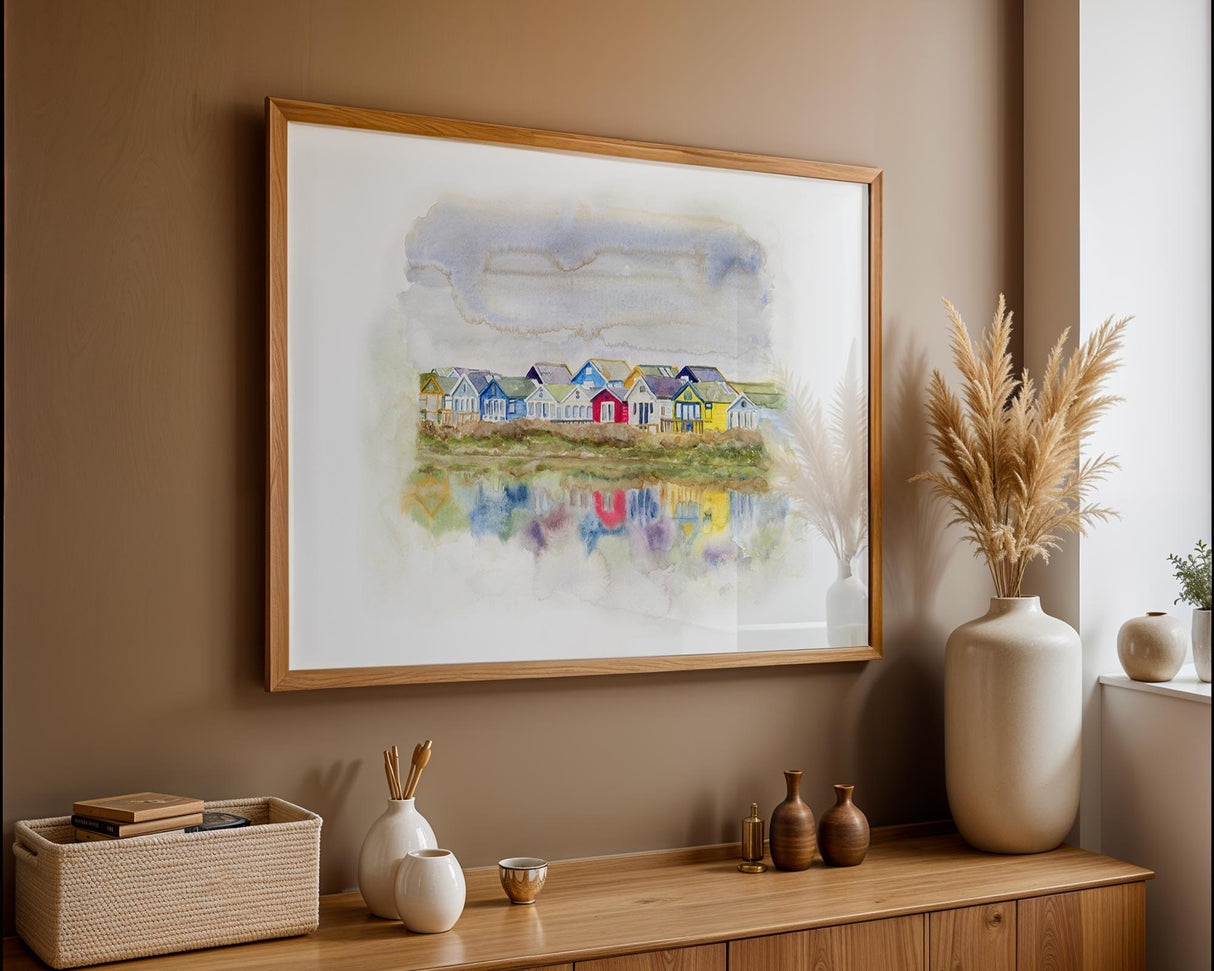 Watercolour print of Mudeford beach huts with colourful reflections on water