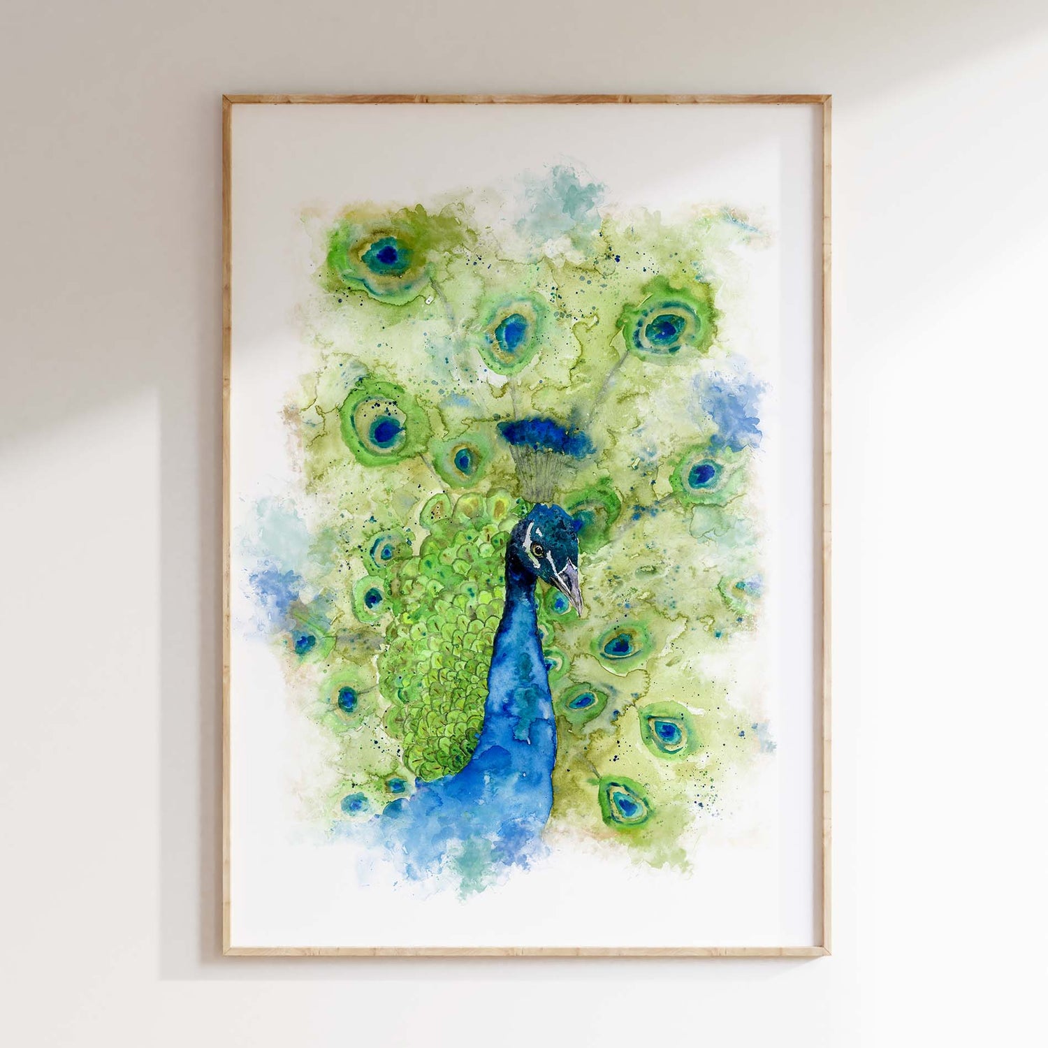 Colourful peacock print with stunning feather detail and a soft, elegant gaze. Regal peacock portrait in shades of green and teal with a fluid, expressive watercolour finish.
