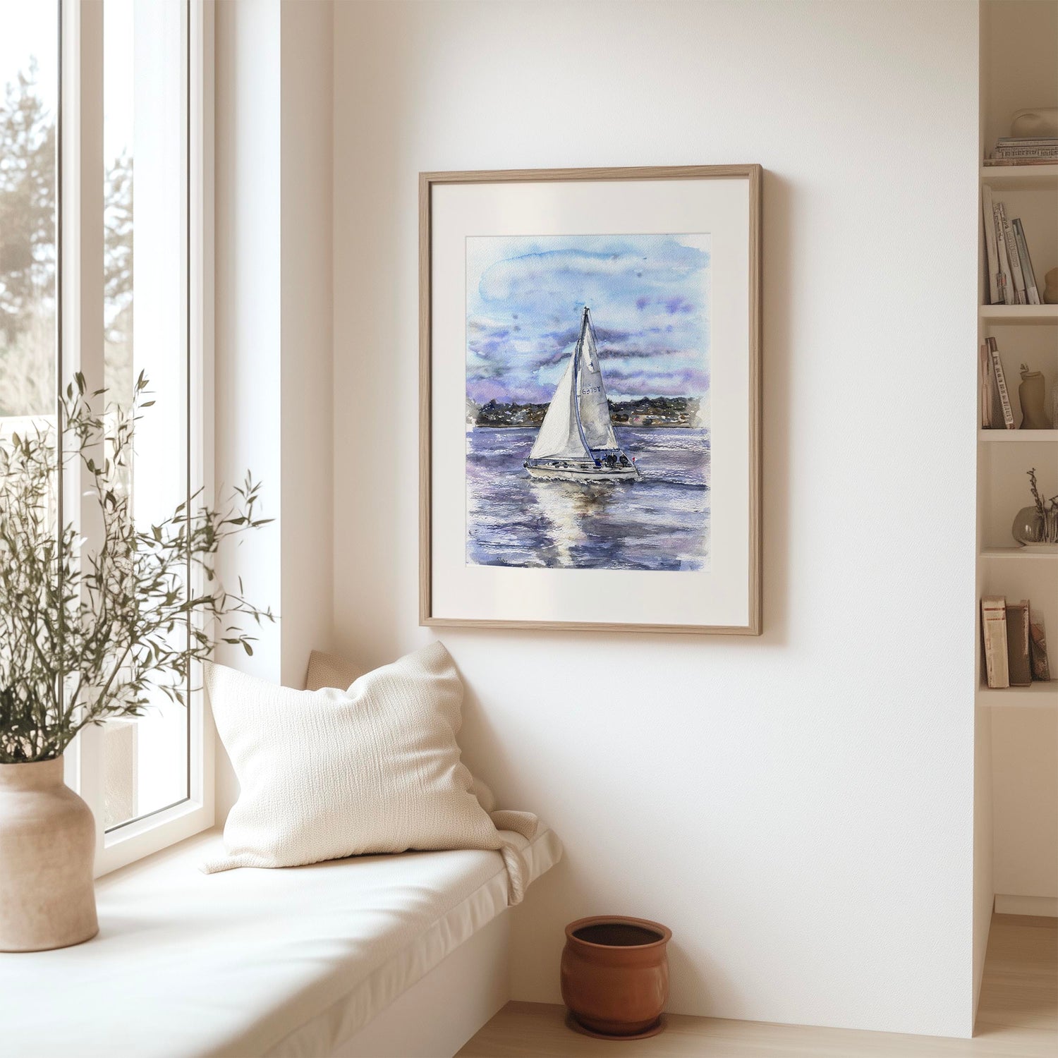 Yacht sailing across Poole Bay with gentle sails and distant coastline, serene coastal wall art.
