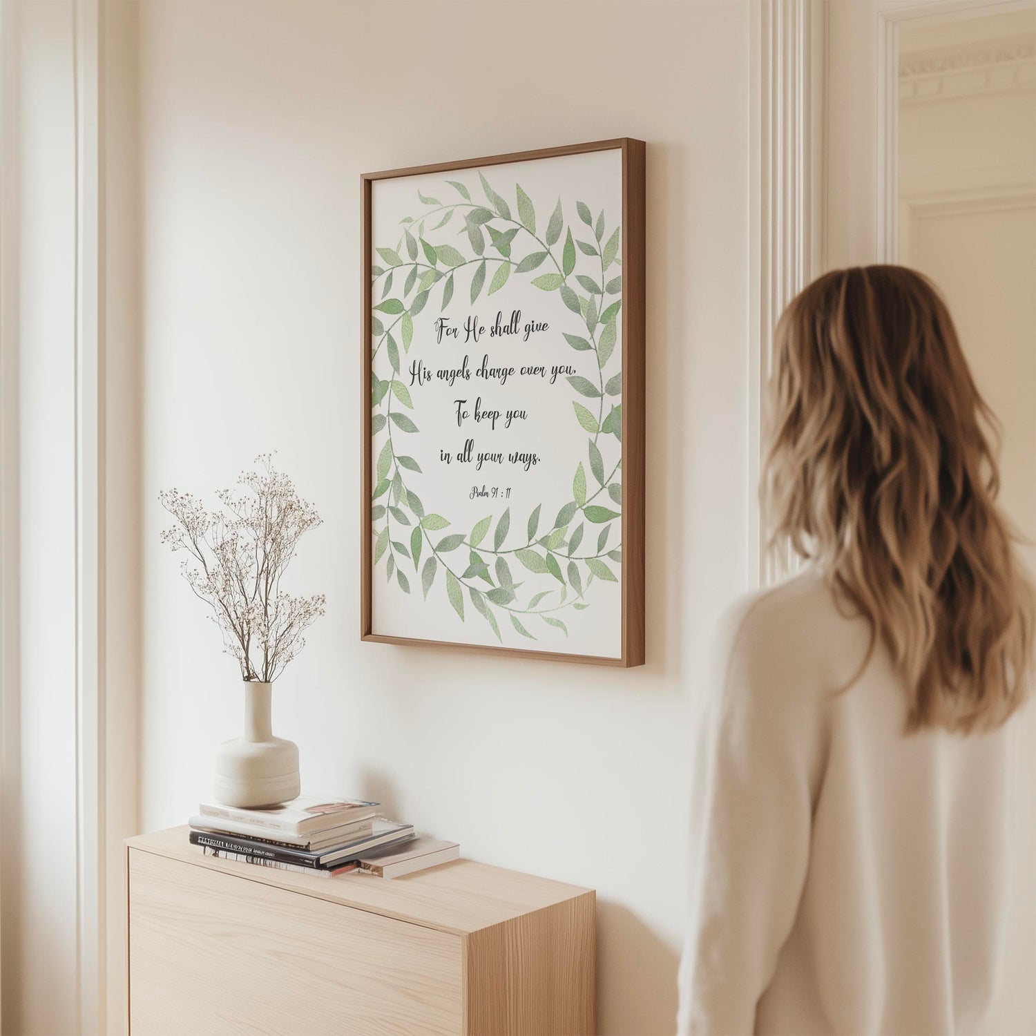 Christian wall art with Psalm 91:11 in a green leaf wreath reminding of angelic protection and divine care.