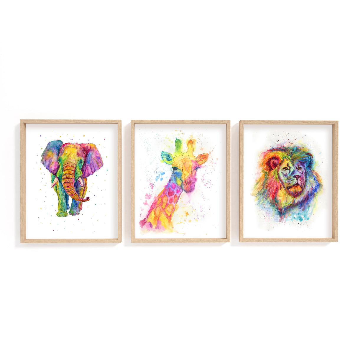 Rainbow animal print set. Colourful elephant, lion and giraffe wall art in loose watercolour style.