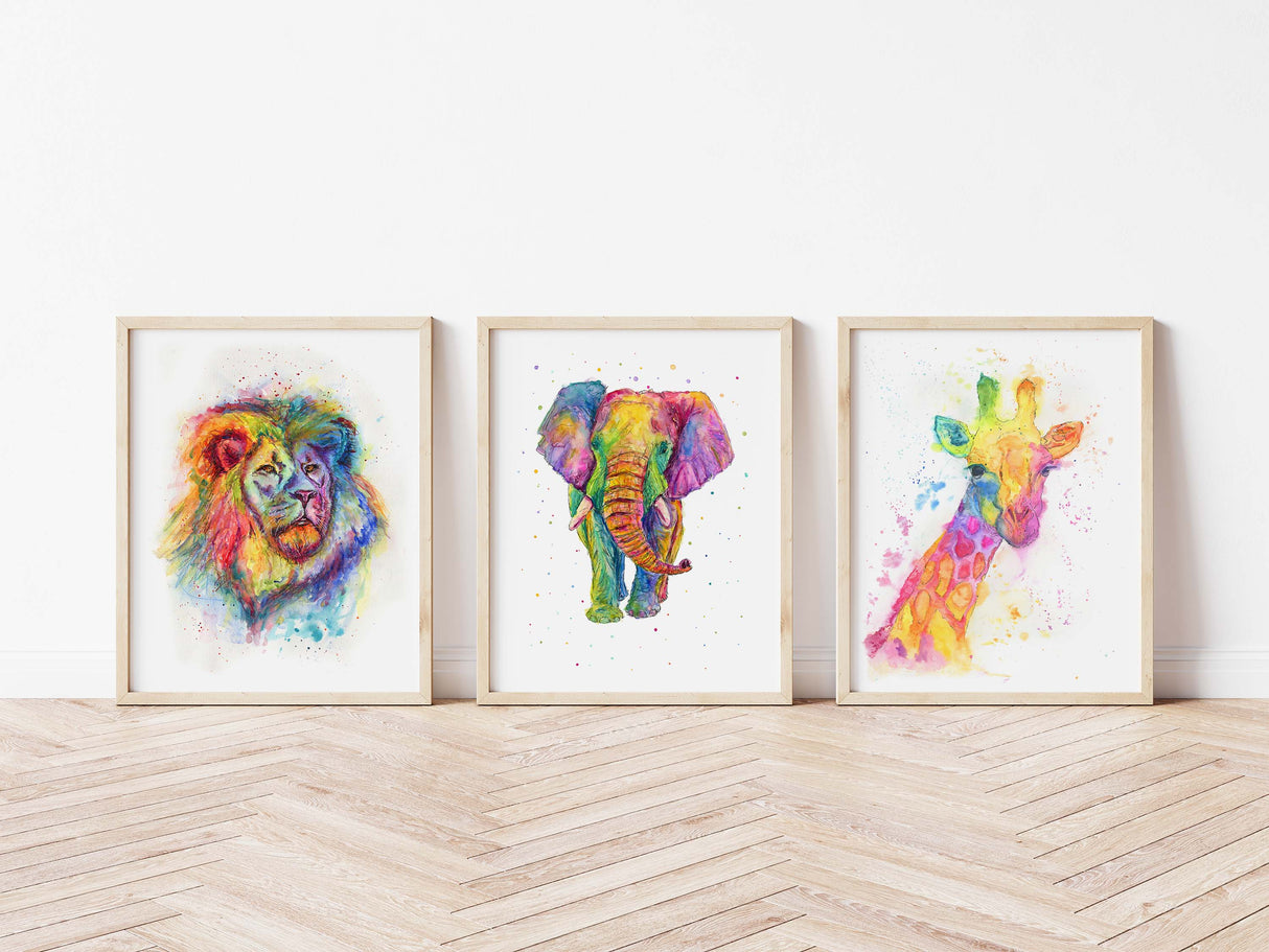 A vibrant rainbow watercolour print set featuring an elephant, giraffe, and lion.