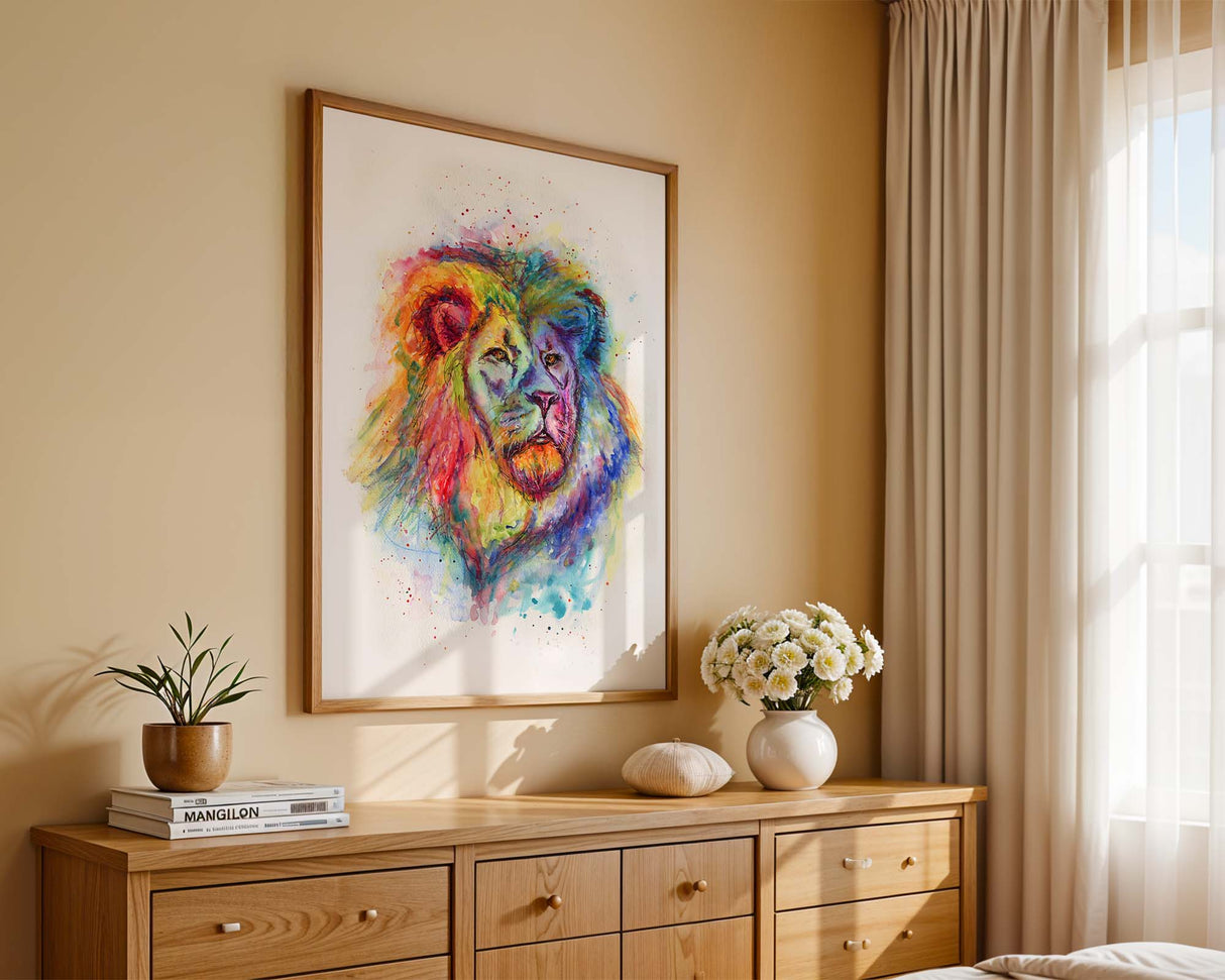 Watercolour lion artwork with soft yet striking rainbow tones, full of movement. Majestic lion portrait print painted in red, yellow, green, and blue watercolour brushstrokes.