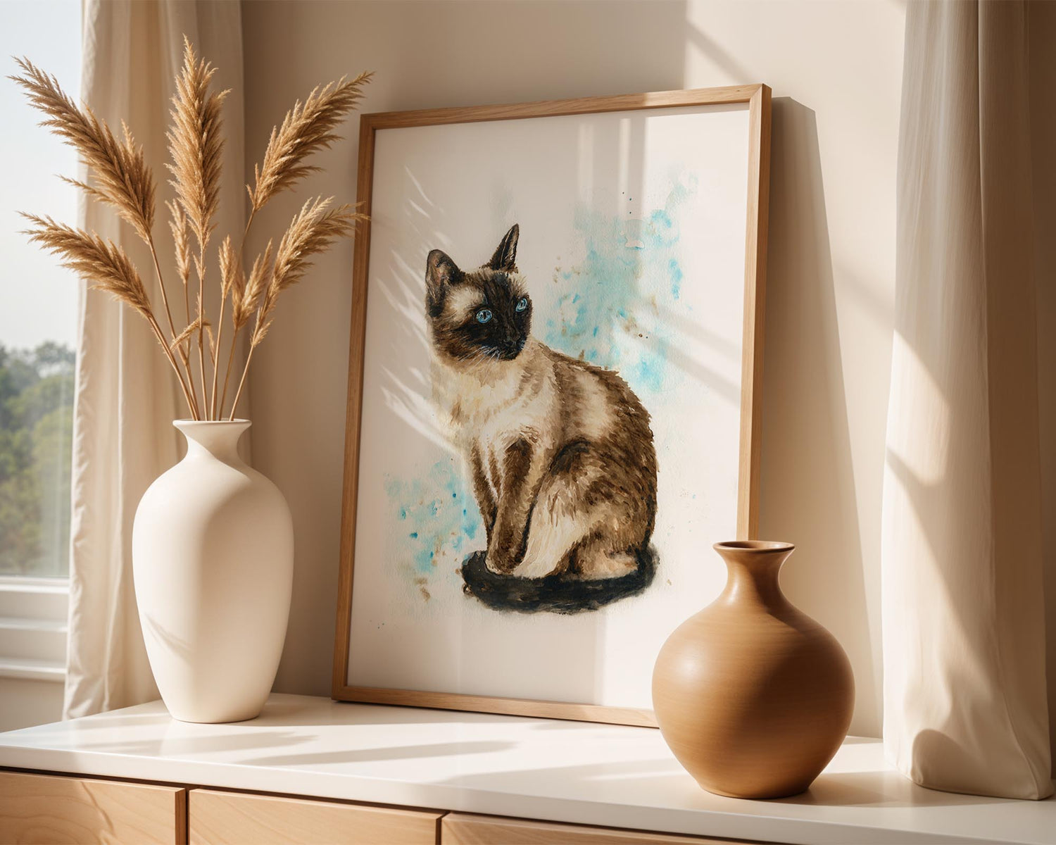 Whimsical watercolour artwork of a Siamese cat sitting calmly, with splashes of soft blues and browns creating a dreamy, painterly effect.