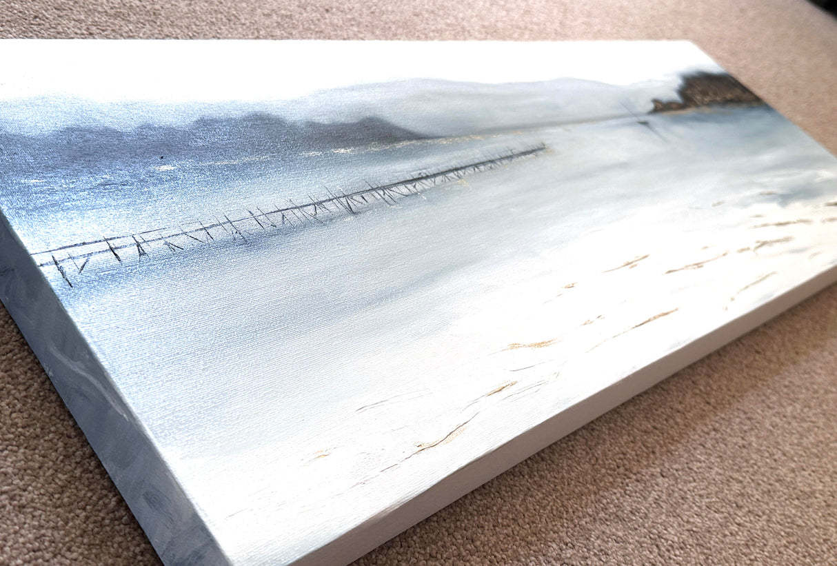 Oil painting of a peaceful coastal scene with a jetty leading towards Brownsea Island, featuring soft indigo and gold tones.