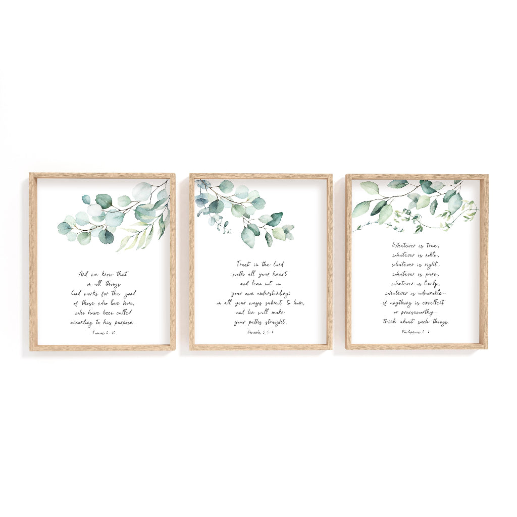 Botanical scripture wall art with eucalyptus leaves and Romans 8:28 verse.