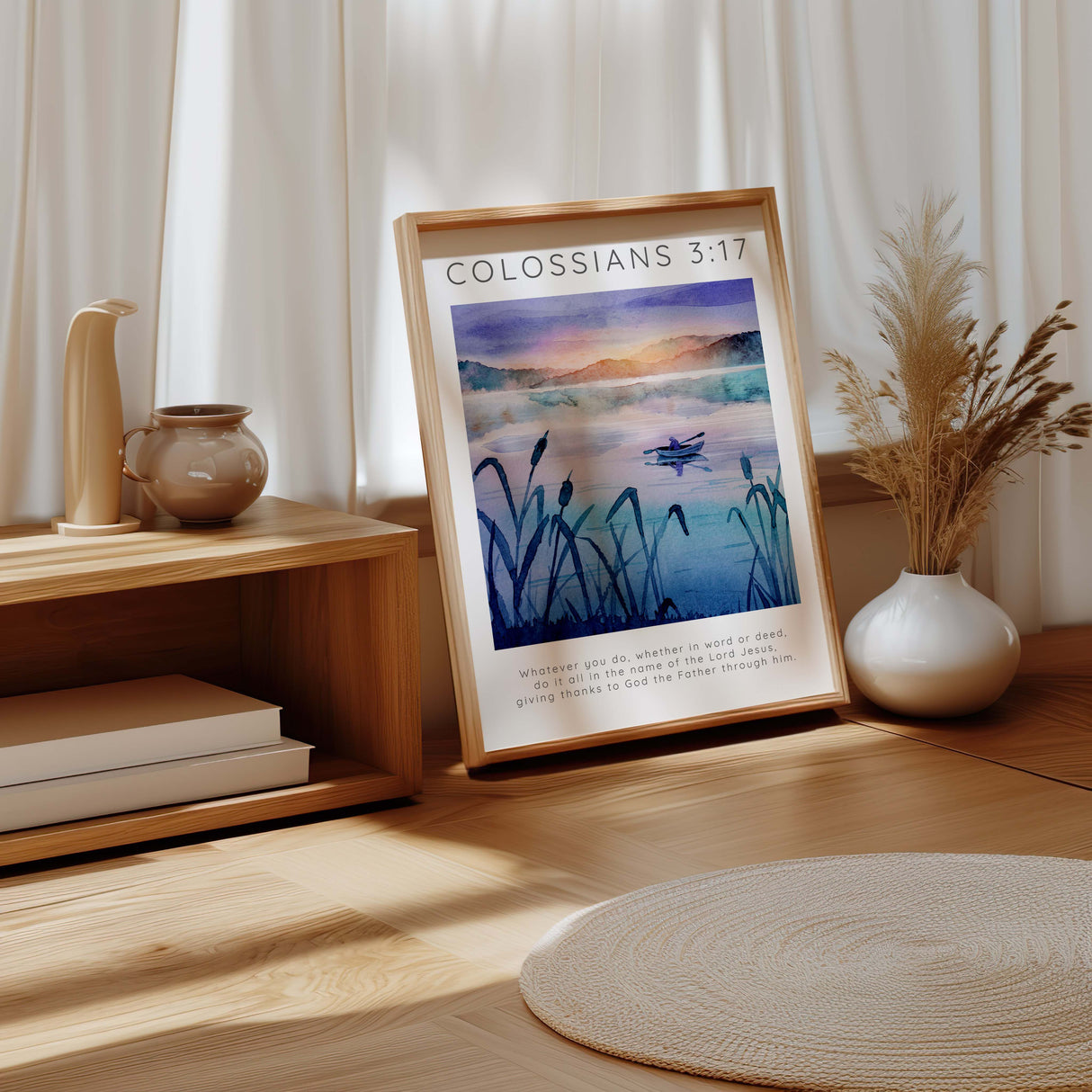 Bible verse print with Colossians 3:17 over a peaceful mountain and river landscape. Christian wall art featuring a fisherman in a boat on a serene river with Scripture about doing all in Jesus' name.
