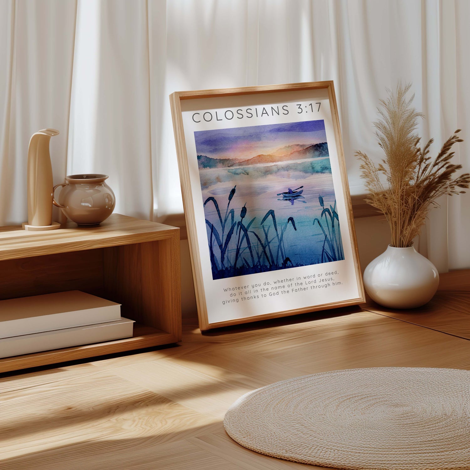Bible verse print with Colossians 3:17 over a peaceful mountain and river landscape. Christian wall art featuring a fisherman in a boat on a serene river with Scripture about doing all in Jesus' name.