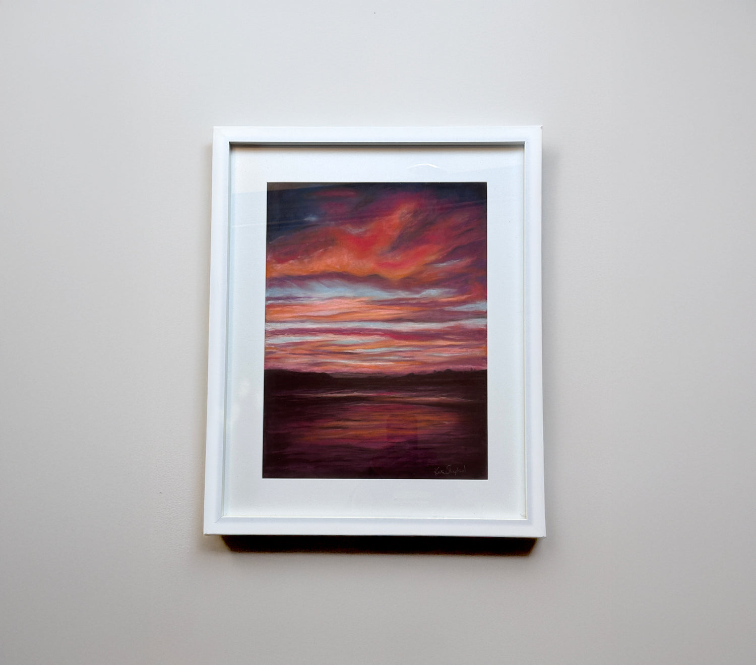 Dramatic sky over Poole Bay in a framed original pastel painting by artist Kate Shephard.