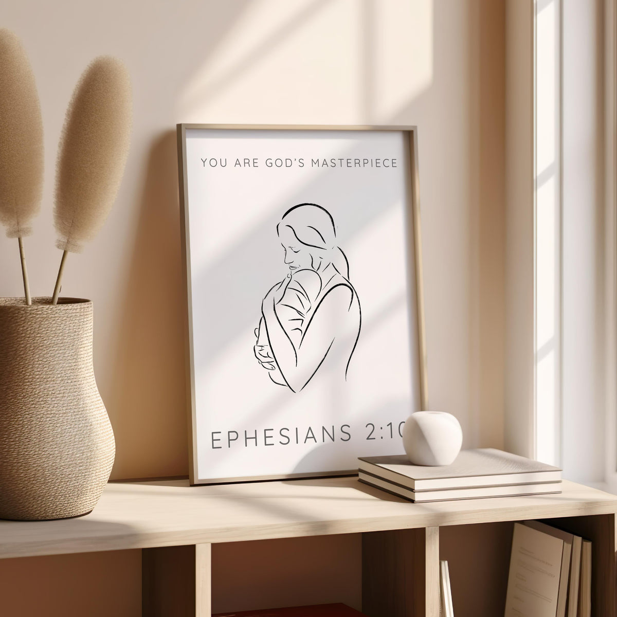 Minimalist line illustration of a mother holding her infant close, paired with the inspirational scripture “You are God’s Masterpiece” from Ephesians 2:10.