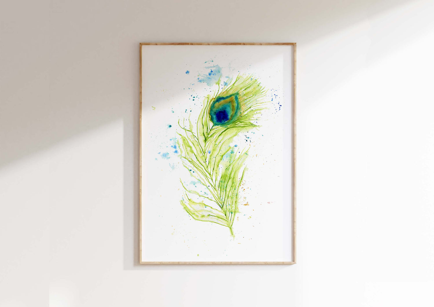 Modern nature-inspired wall art featuring a single peacock feather