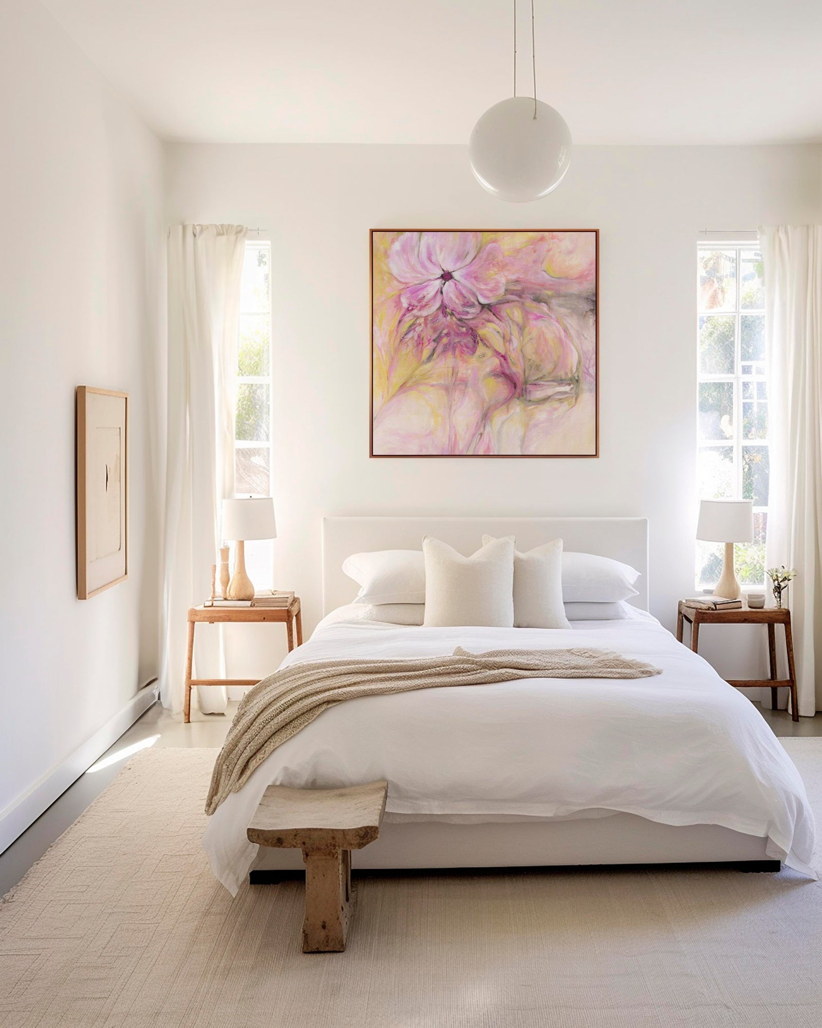 Canvas bedroom art — 'Through It All' framed watercolour floral canvas print in soft pink and yellow tones displayed above a bed, beautiful calming canvas bedroom art by Crafty Cow Design.