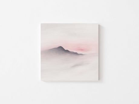 Soft blush tones and simple mountain design in wall art print.