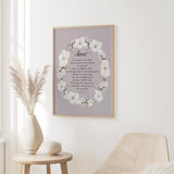 Floral wreath wall art featuring Bible verse from 1 Corinthians 13 on love, kindness, and commitment.