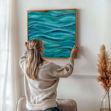 Coastal-inspired acrylic painting with overlapping waves in blue hues.