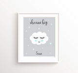 Yellow cloud nursery decor print with matching stars and personalised name, perfect for a cheerful baby room.