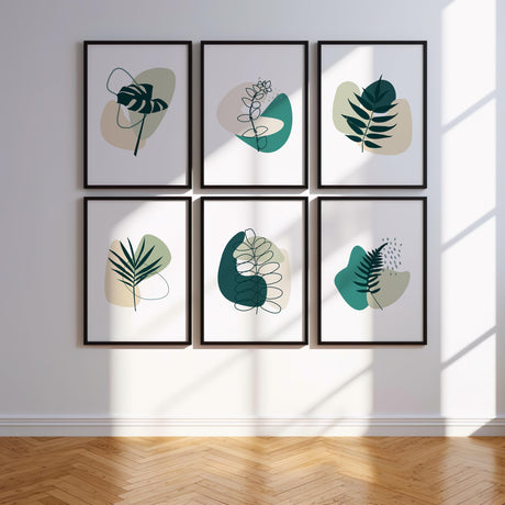 Minimalist botanical wall art set with elegant line drawings of leaves and foliage in jade and sage green, designed to bring a serene atmosphere to any space.