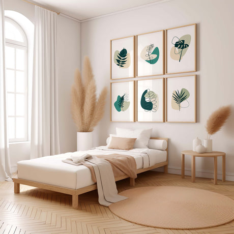 Botanical print set in soft jade and sage hues, showcasing fine line art of plants and leaves. Available as a cohesive set of 3 to 6 coordinating prints.