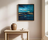 Blue and turquoise abstract seascape artwork featuring gold leaf accents for elegant coastal decor.

