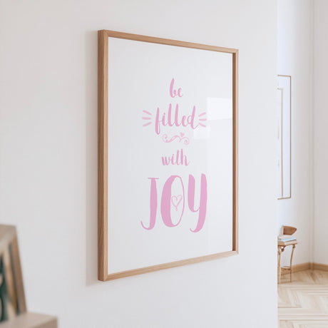 Be Filled With Joy nursery decor in soft pink and white, perfect for Christian families and new babies.