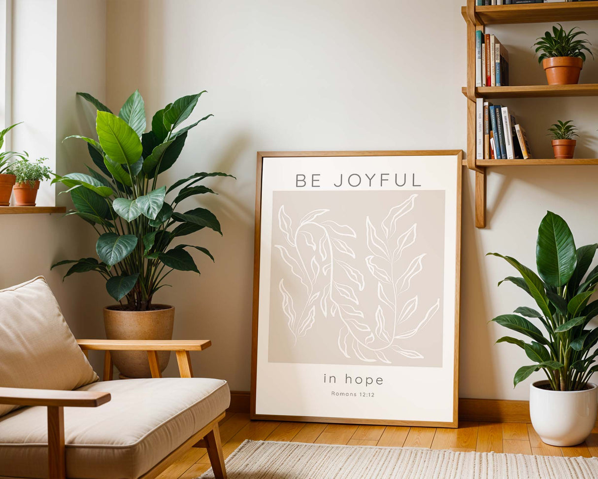 Inspirational Bible verse print in soft neutral colours with delicate leaves and message of hope and joy.

