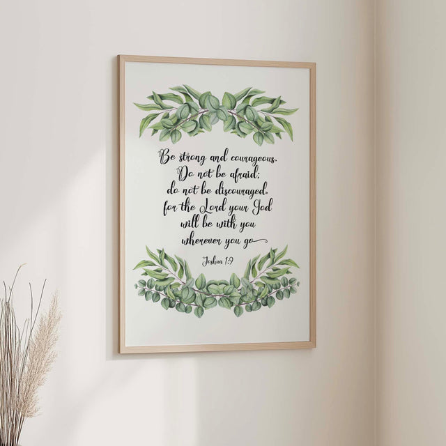 Christian wall art with Joshua 1:9 scripture surrounded by elegant vines and floral details.