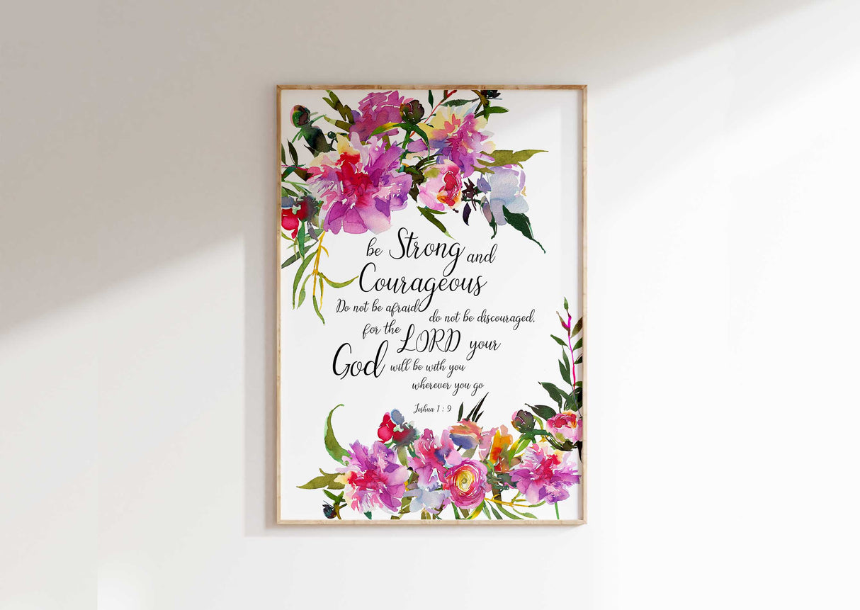 Be Strong And Courageous Christian wall art featuring Joshua 1:9 and pretty pink flowers.