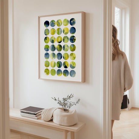 Abstract portrait art print of green, yellow and indigo watercolour circles on a white background.