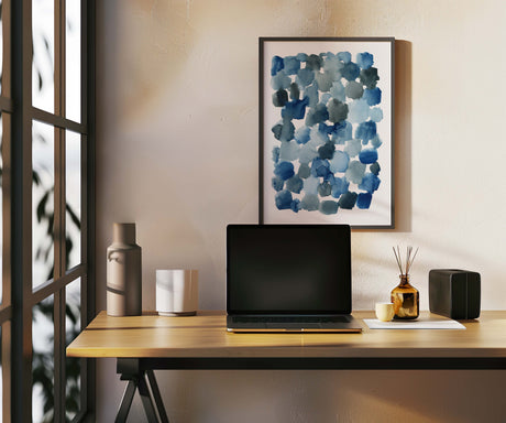Abstract watercolor print featuring soft indigo blue shapes blending seamlessly.