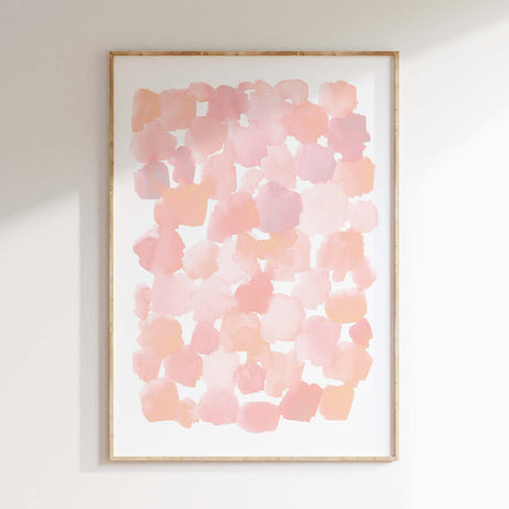 Abstract watercolor print featuring soft pink shapes blending beautifully on paper.